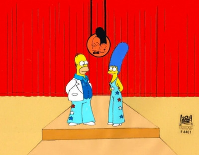 Homer Simpson and Marge on stage